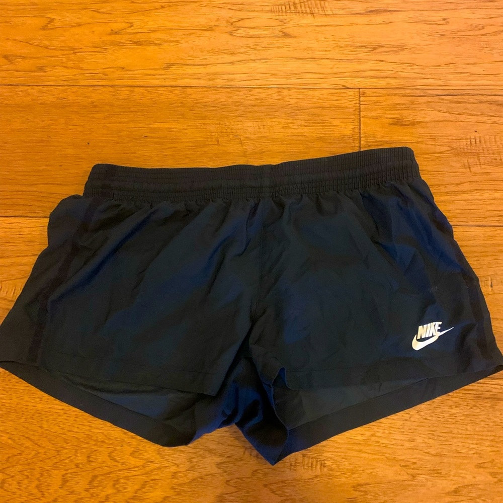 Black Nike running shorts